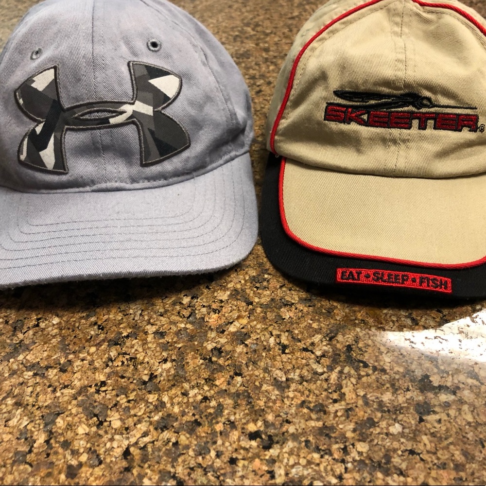 Two youth sized baseball style caps.